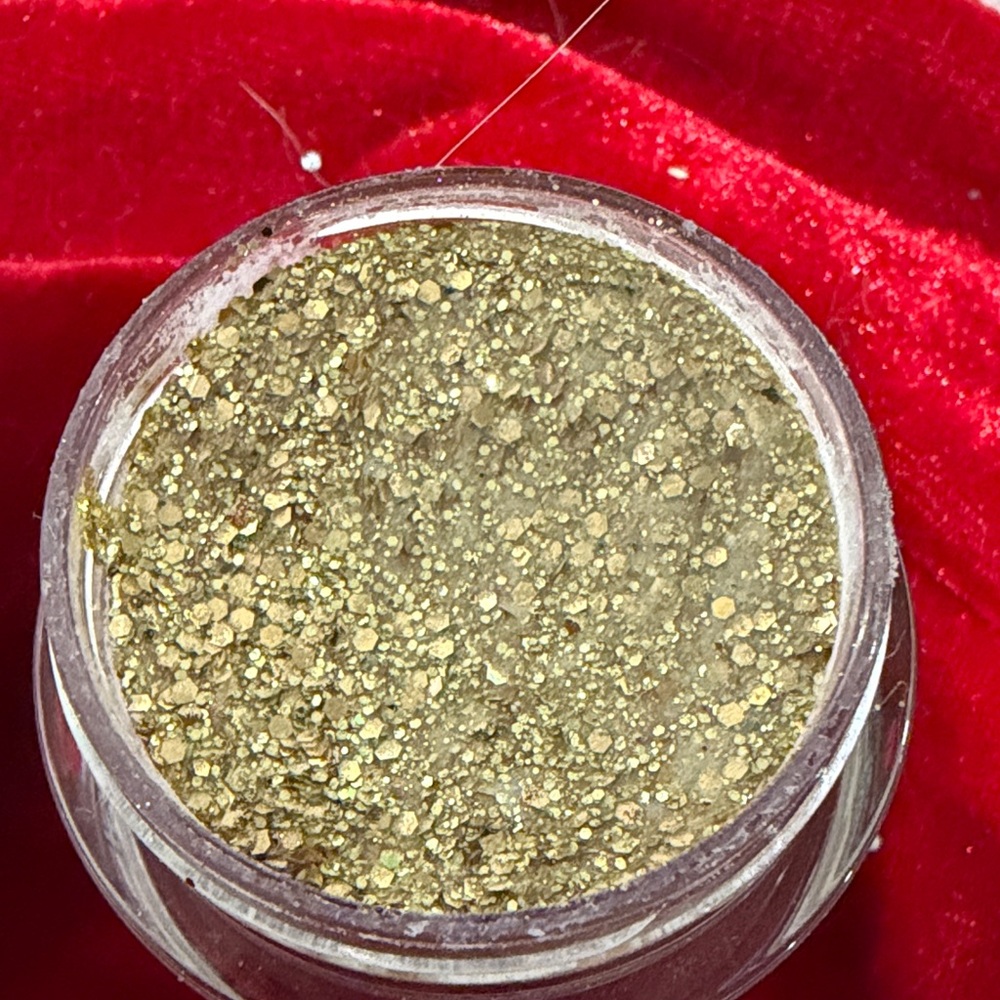 Deck the Nails with Revel's Tinsel - gold nail dip powder.